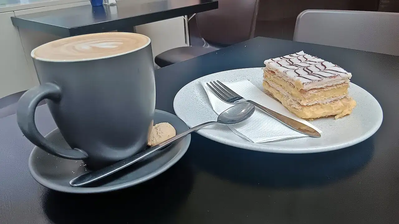Mille-feuille with a coffee